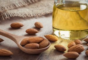 applying almond oil to enlarge the penis
